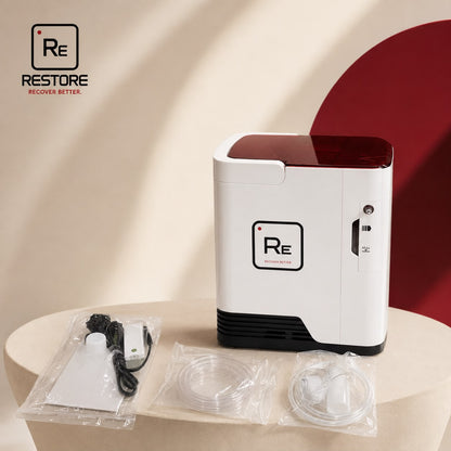 Restore Compact Oxygen Concentrator and accessories in a warm room