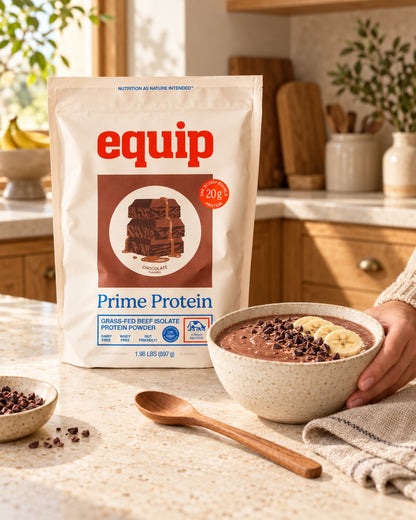 Prime Protein Chocolate pouch with a chocolate protein bowl topped with banana